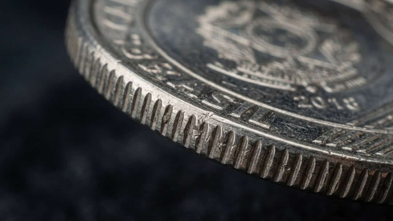 Para que servem as ranhas na borda das moedas?