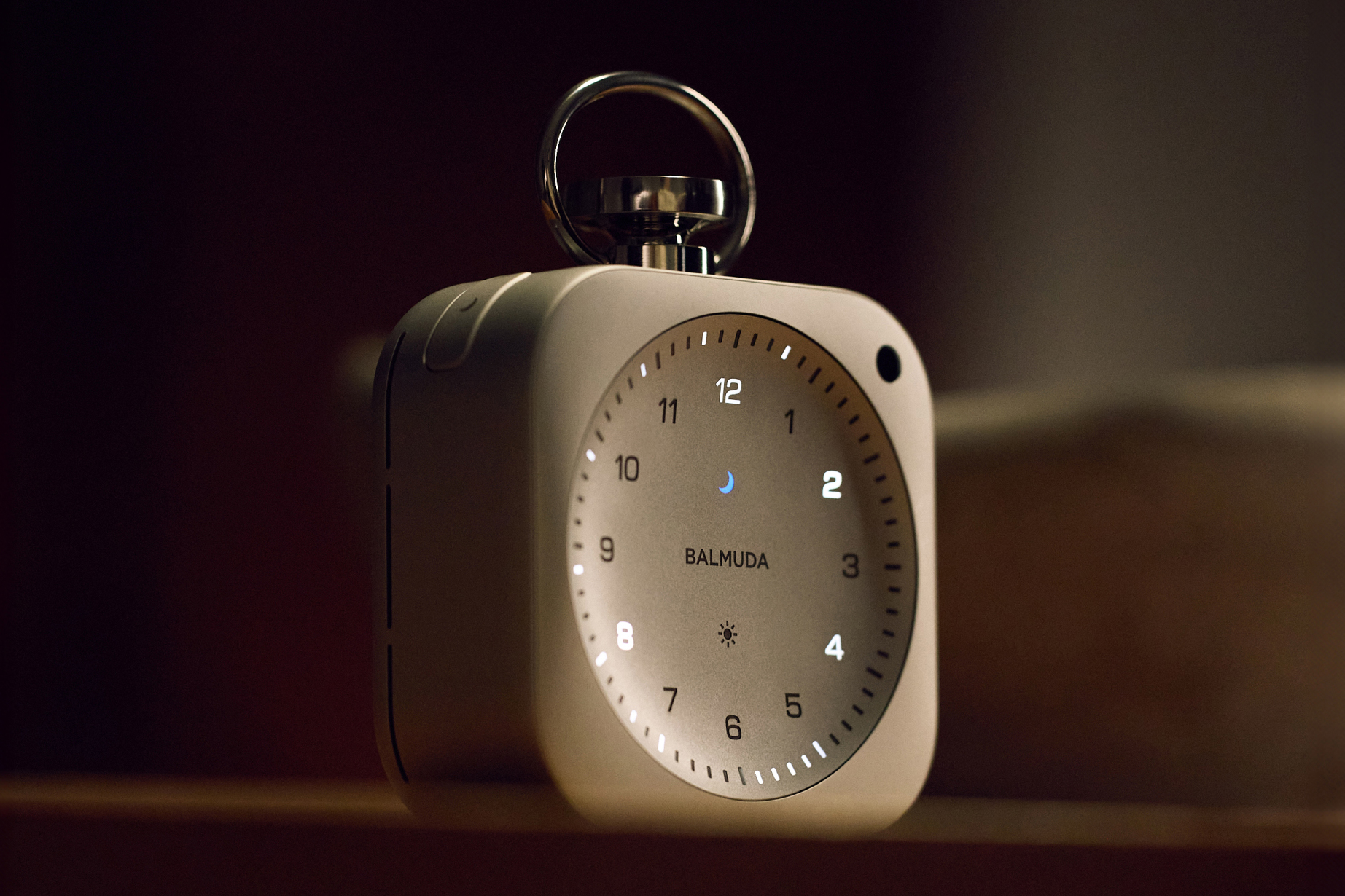 This sleek alarm clock uses lights and sounds to help you sleep, focus, and wake up