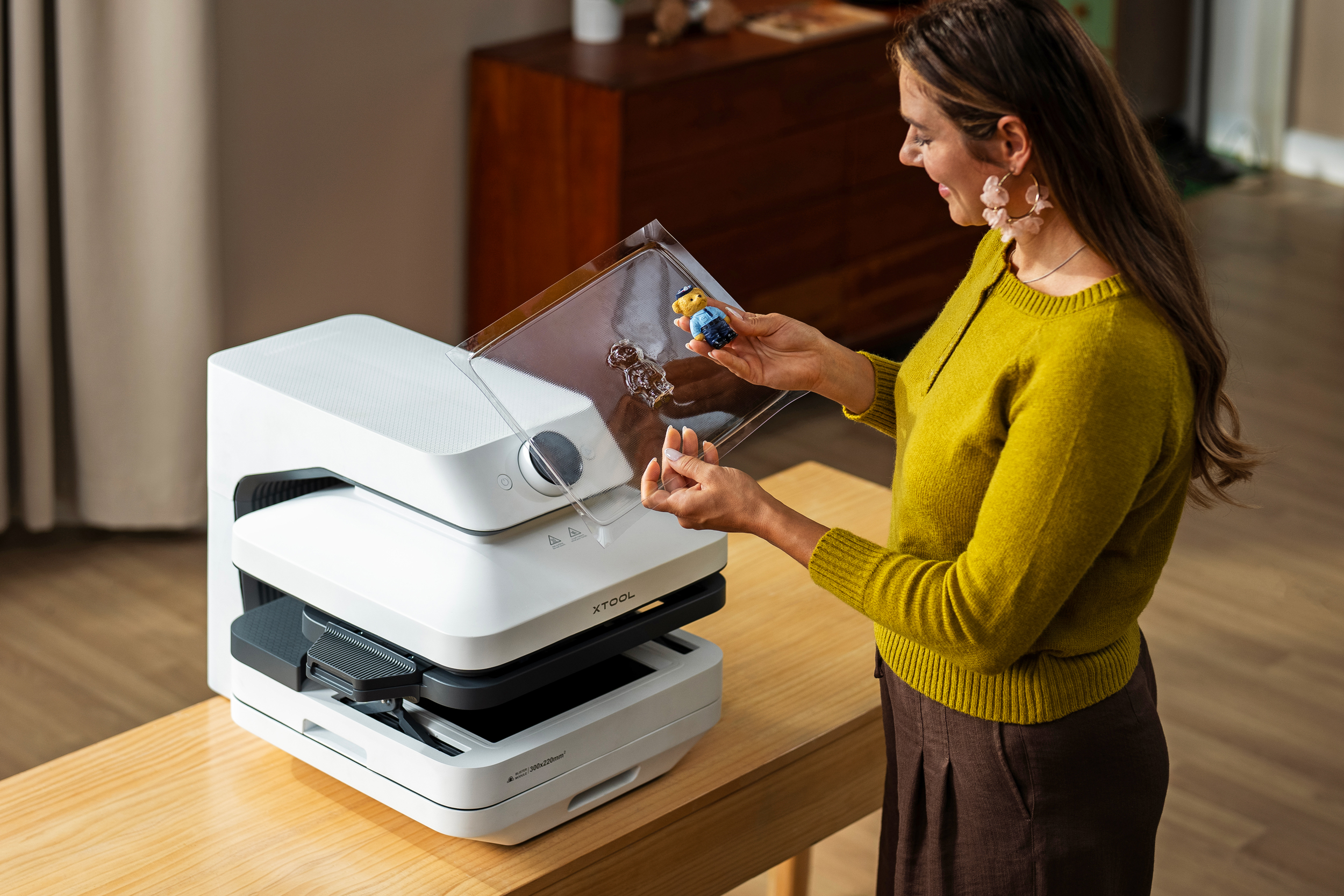 This modular crafting machine can create custom shirts, phone cases, and molds